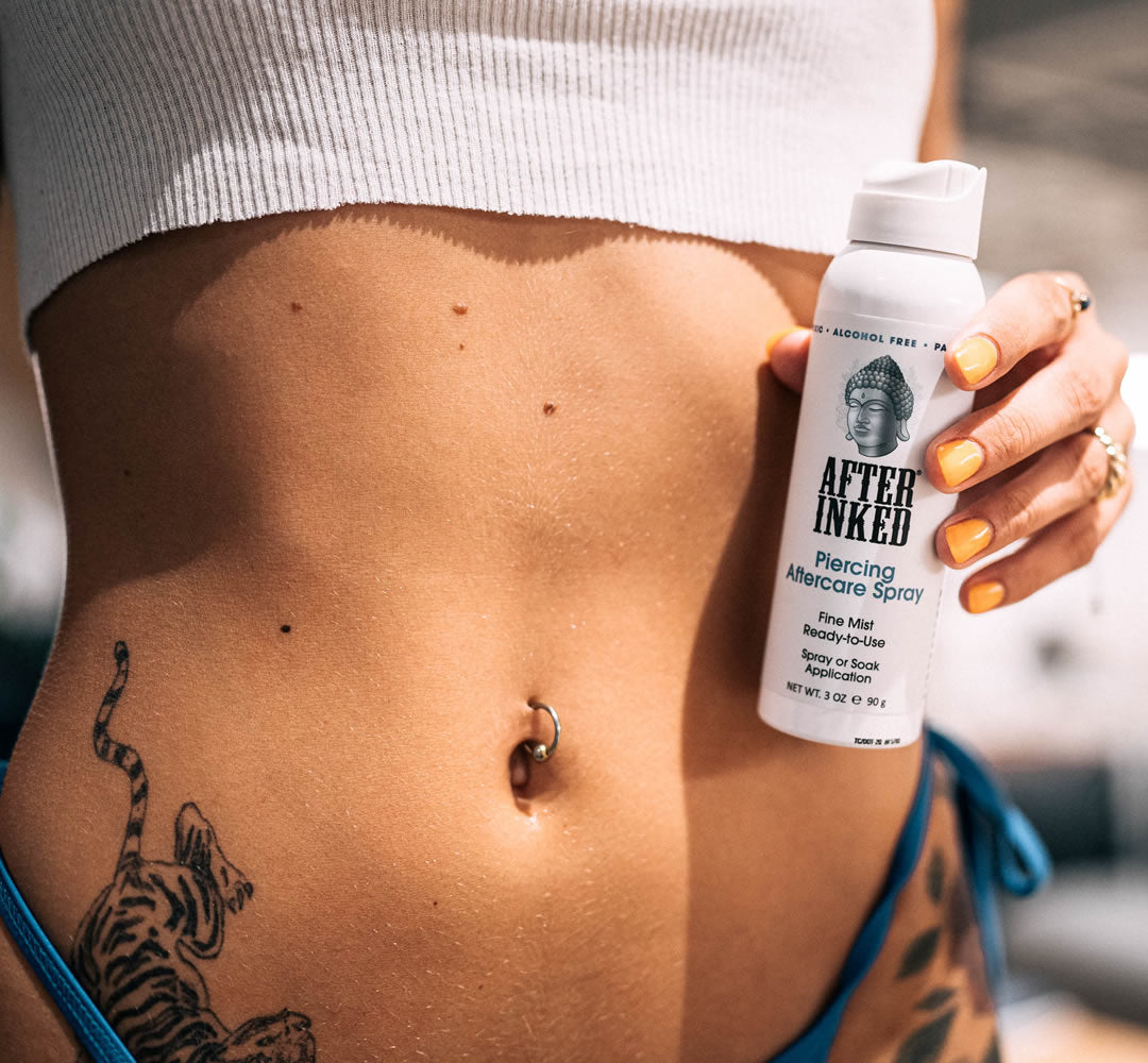 belly piercing. After Inked piercing aftercare spray