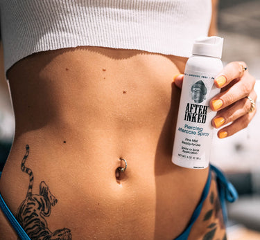belly piercing. After Inked piercing aftercare spray